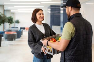 delivery-man-giving-groceries-order-customer delivery-man-giving-groceries-order-customer